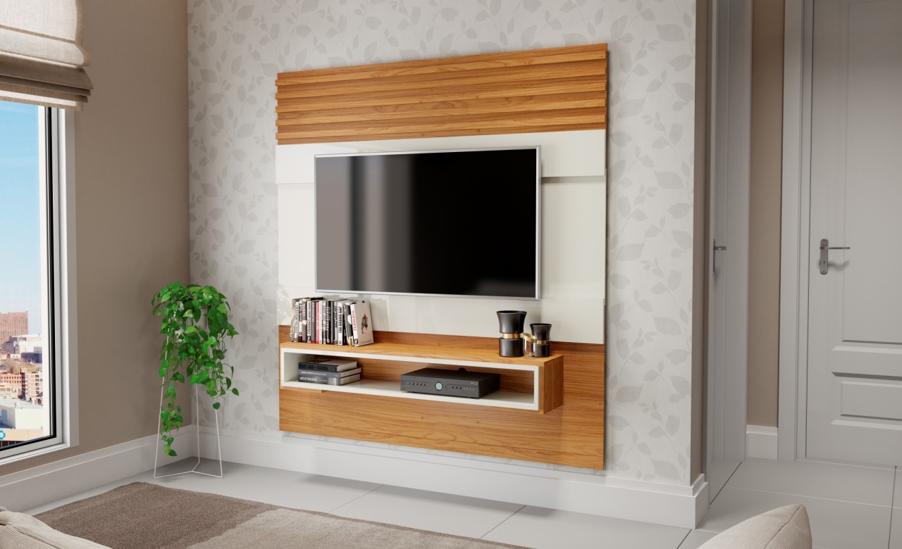 Sala de estar com painel pednurado na parede com uma televisão